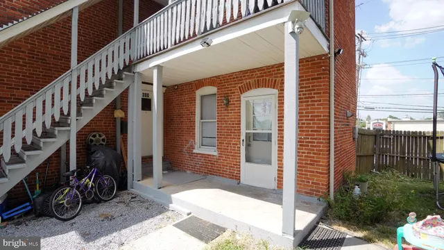 a view of an entrance with stairs