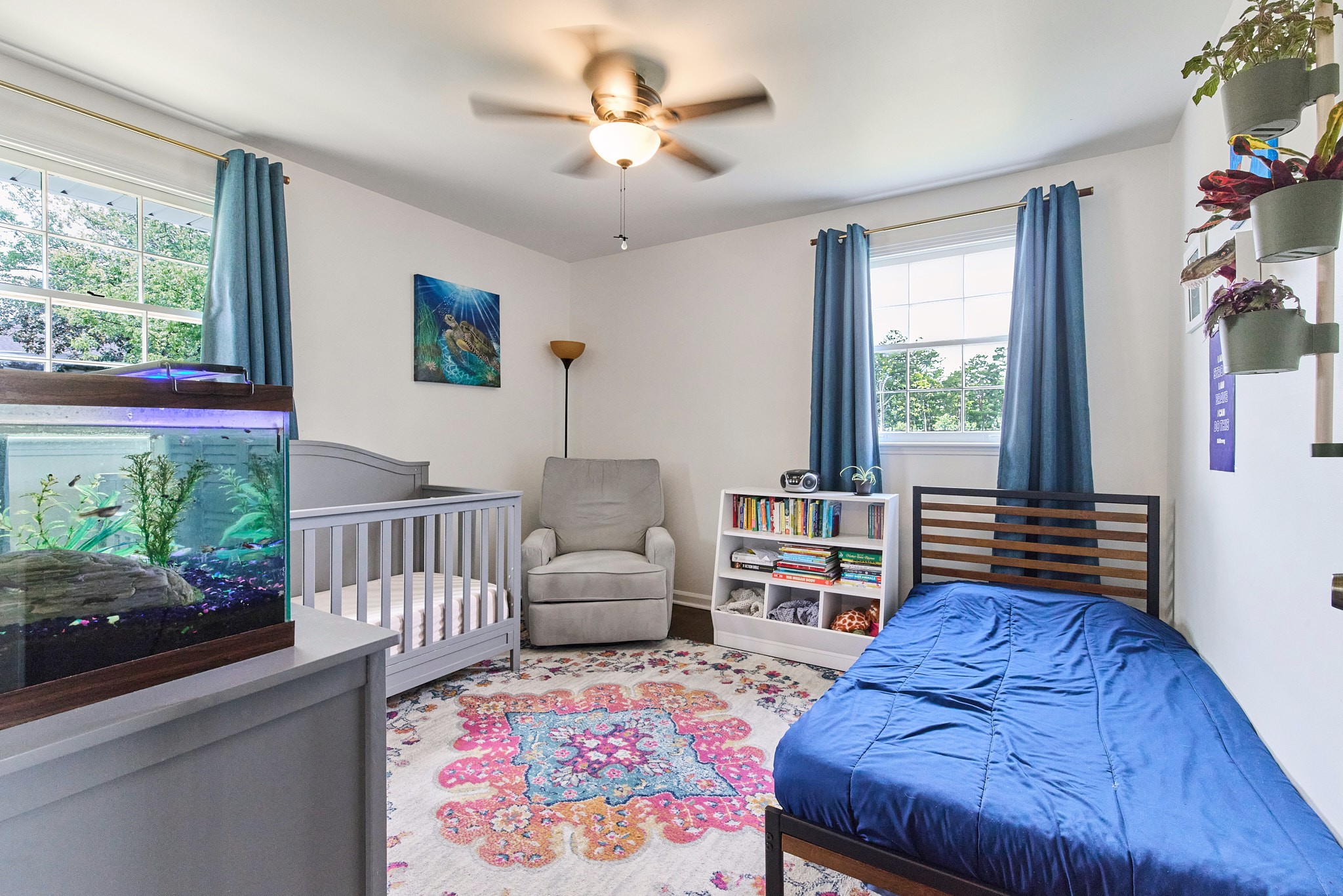 1250 Sioux Terrace Madison, TN 37115 - Photo 20 of 27 a bedroom with furniture and a book shelf