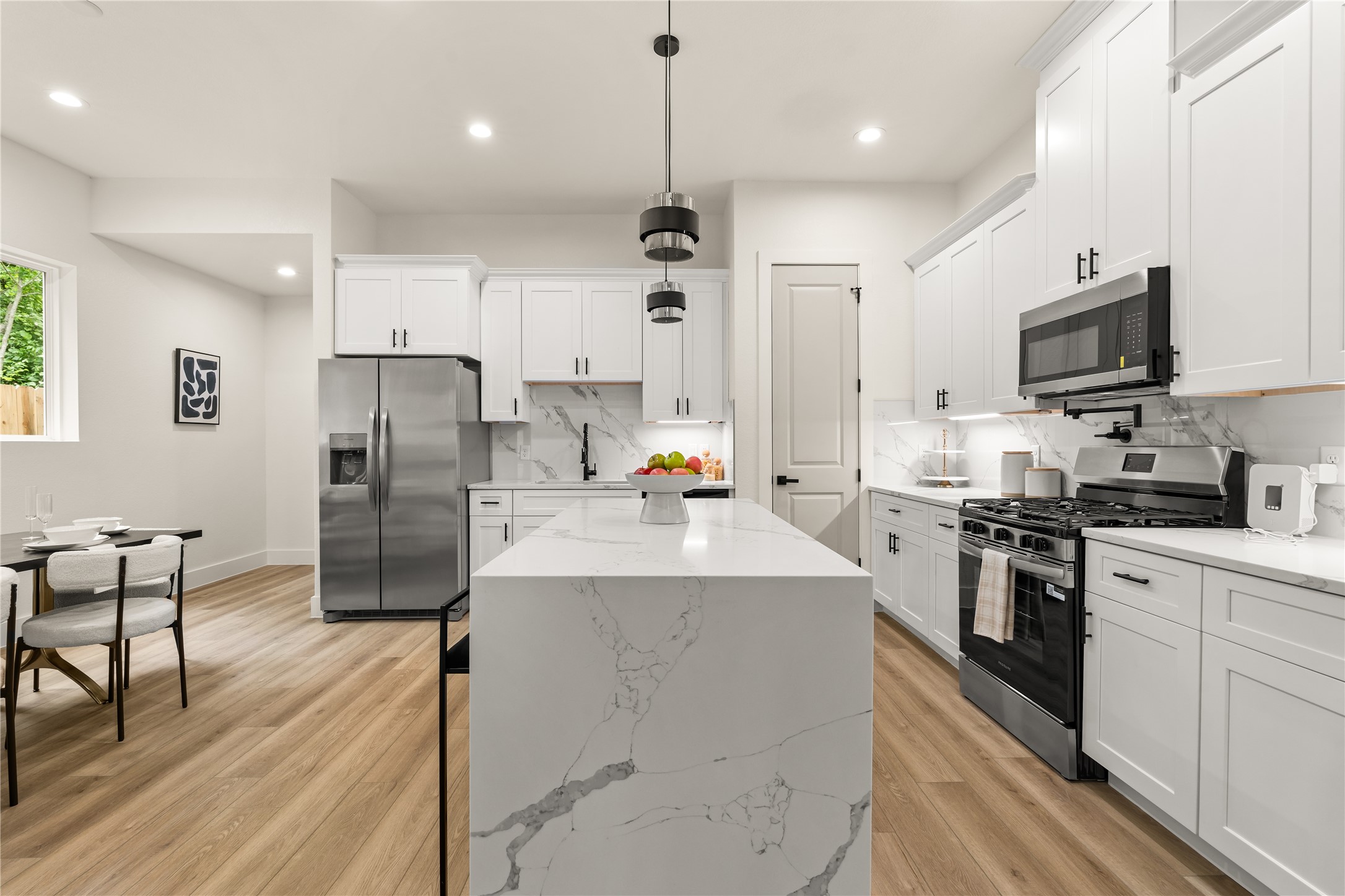 3539 Mainer Street, Unit B Houston, TX 77021 - Photo 6 of 29 Seamless layout with gas range on one side and full-depth fridge on the other