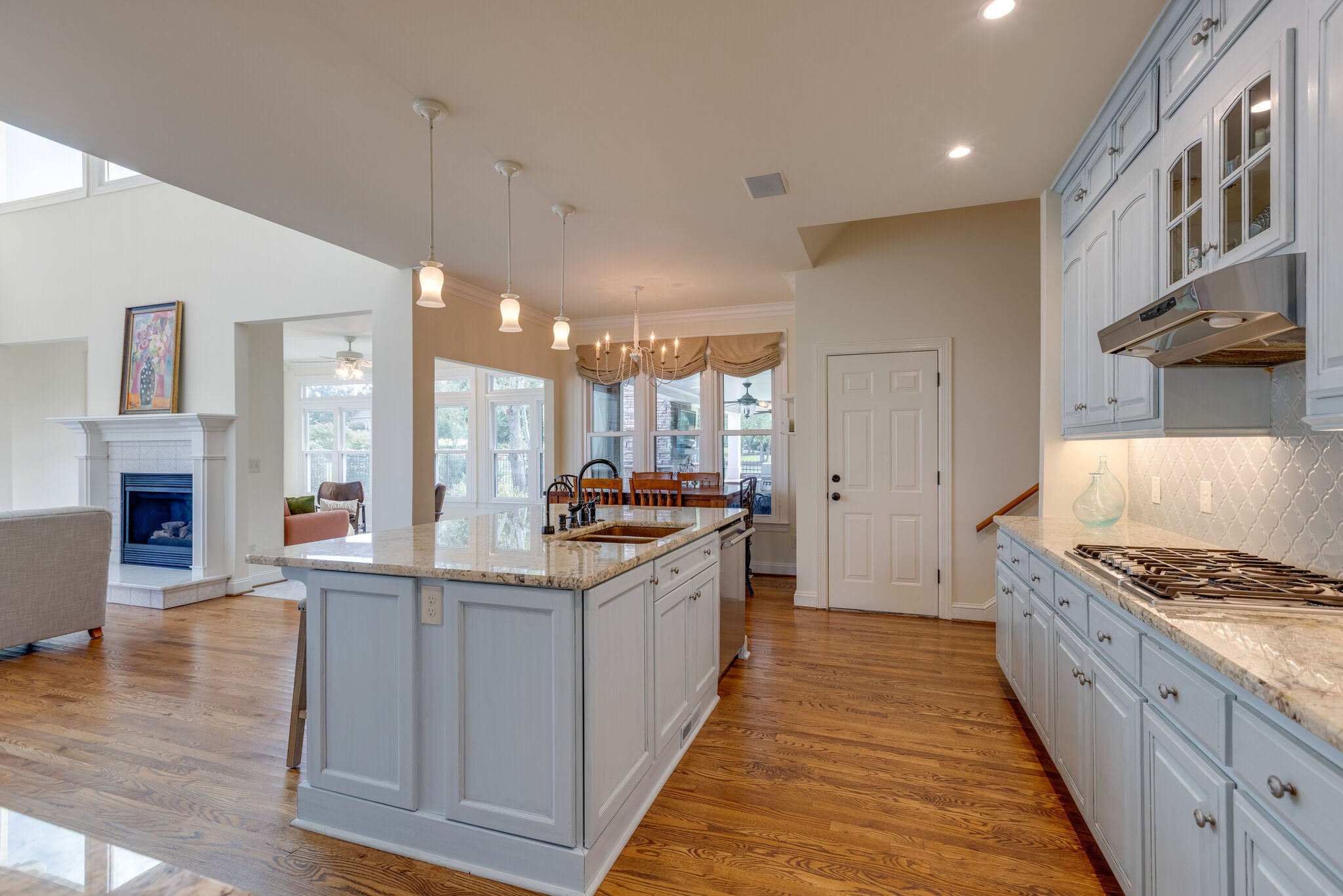 200 Eiderdown Drive Franklin, TN 37064 - Photo 11 of 45 a large kitchen with stainless steel appliances a stove and more cabinets