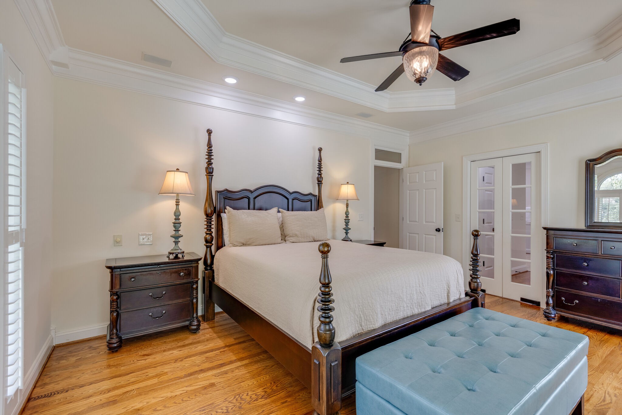 200 Eiderdown Drive Franklin, TN 37064 - Photo 16 of 45 a bedroom with a bed and a chandelier