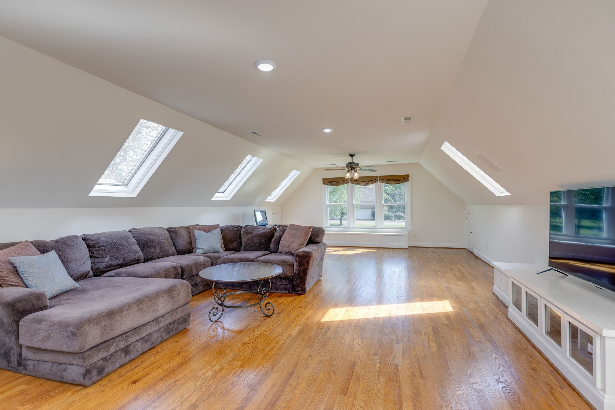200 Eiderdown Drive Franklin, TN 37064 - Photo 28 of 45 a living room with furniture and a wooden floor