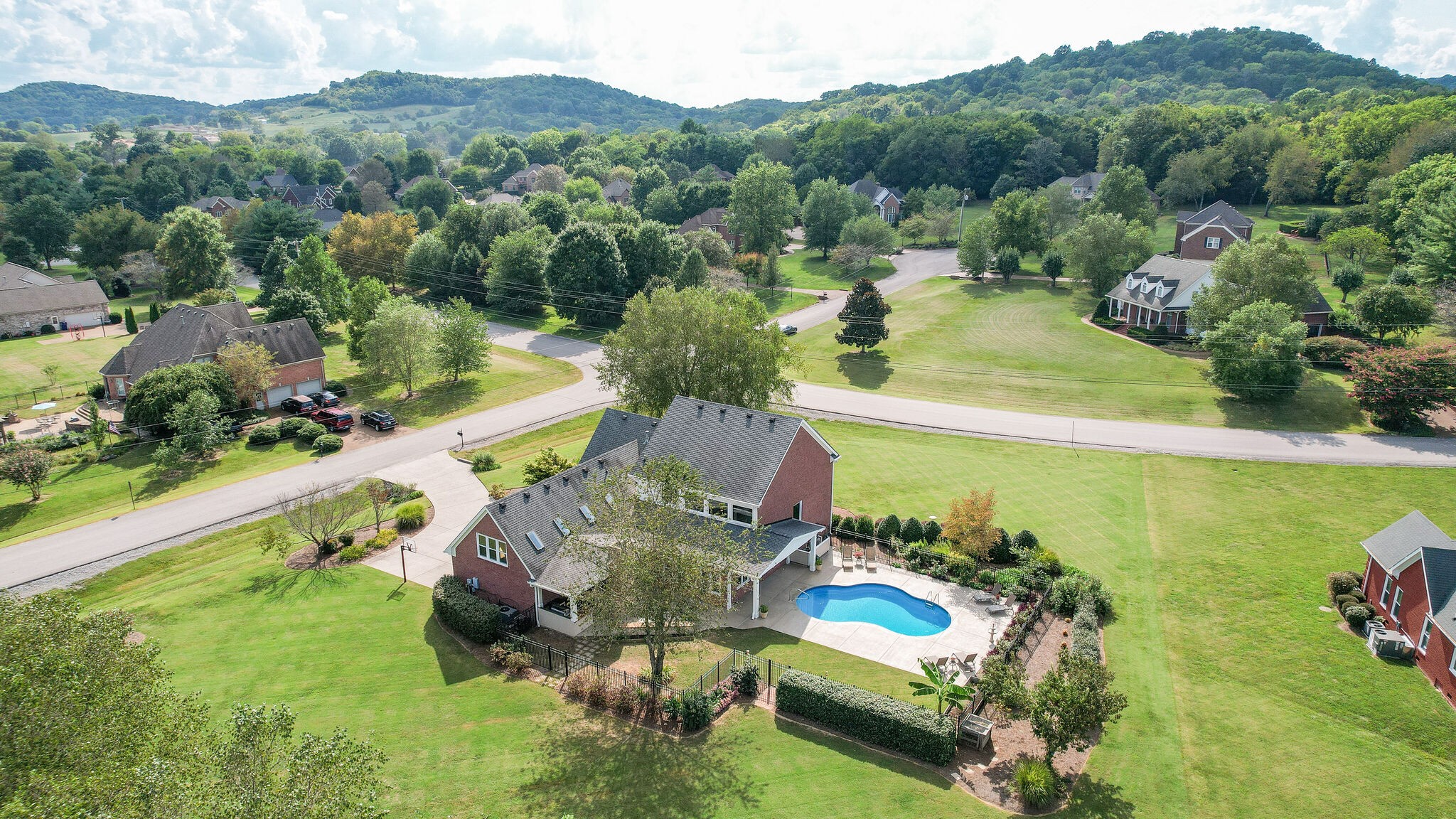 200 Eiderdown Drive Franklin, TN 37064 - Photo 40 of 45 an aerial view of a house with a garden and lake view