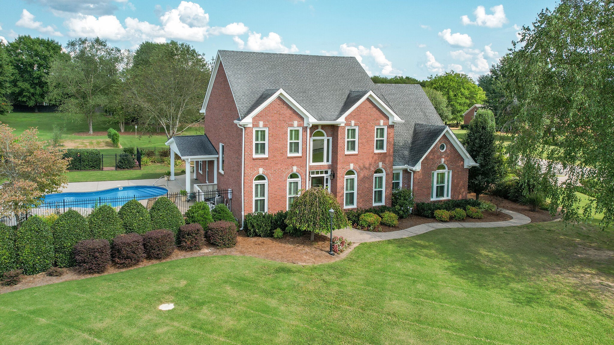 200 Eiderdown Drive Franklin, TN 37064 - Photo 42 of 45 a front view of a house with garden