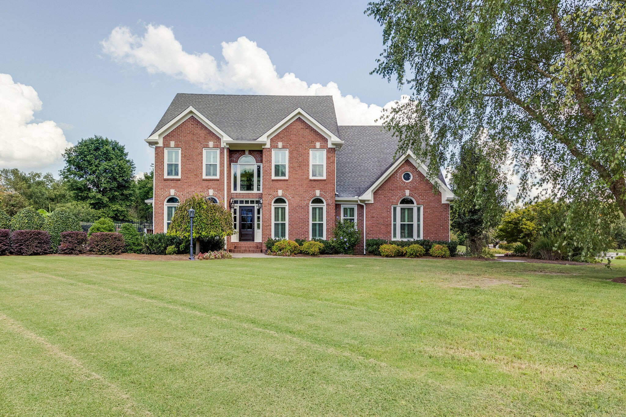 200 Eiderdown Drive Franklin, TN 37064 - Photo 45 of 45 a front view of a house with a yard and garage