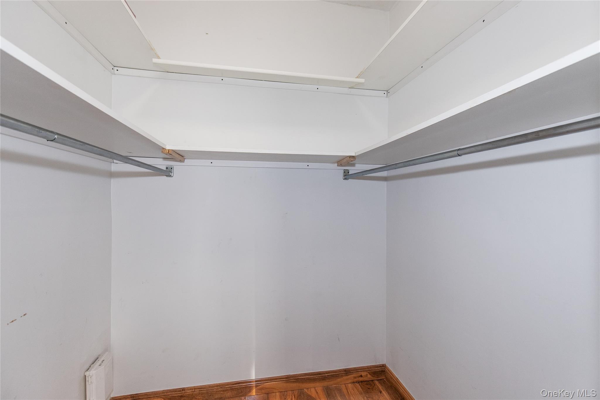 1 Kensington Gate, Unit 302 Great Neck, NY 11021 - Photo 20 of 30 a view of a room with shelf