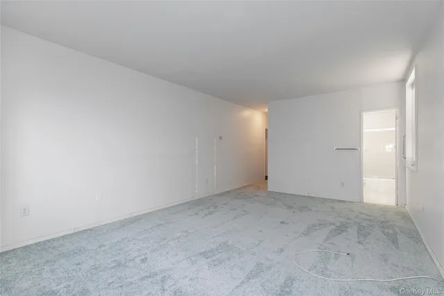 an empty room with an entryway
