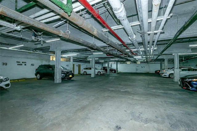 a view of parking garage with parking space