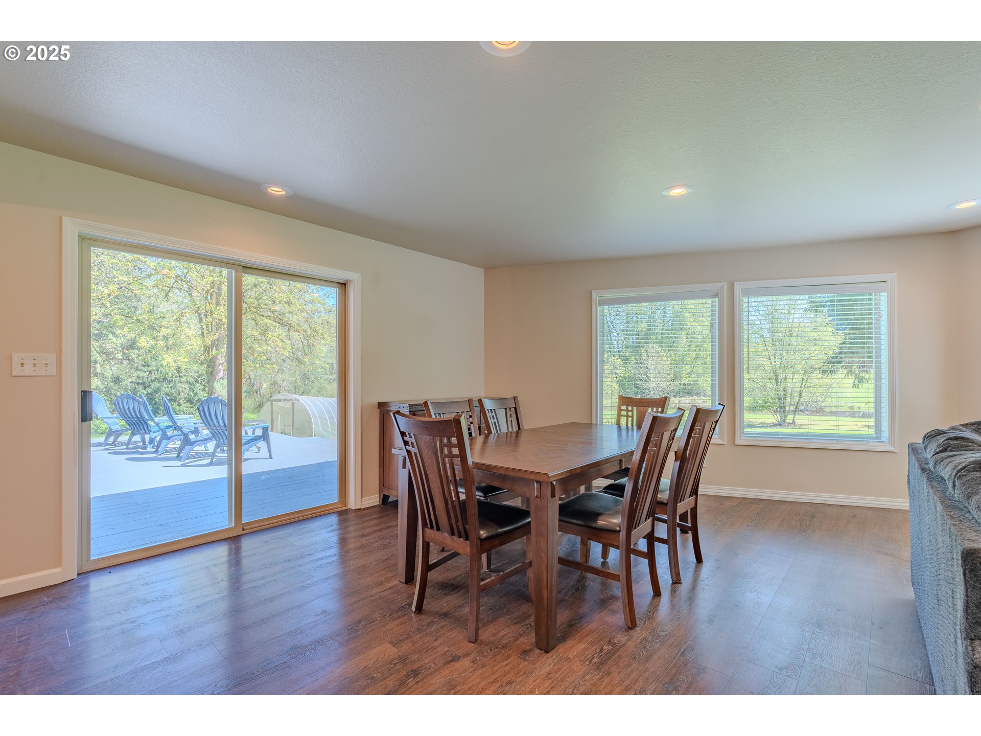2126 Northeast 194th Street Ridgefield, WA 98642 - Photo 12 of 44 a view of a dining room with furniture and wooden floor