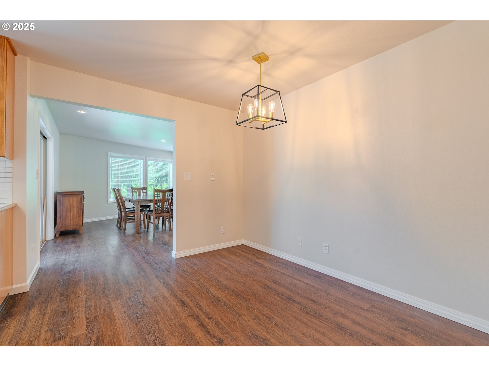 2126 Northeast 194th Street Ridgefield, WA 98642 - Photo 18 of 44 a view of a livingroom with wooden floor and furniture