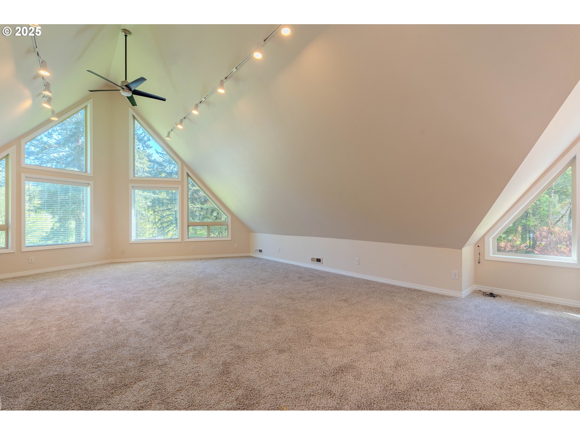 2126 Northeast 194th Street Ridgefield, WA 98642 - Photo 30 of 44 a view of an empty room with windows and stairs