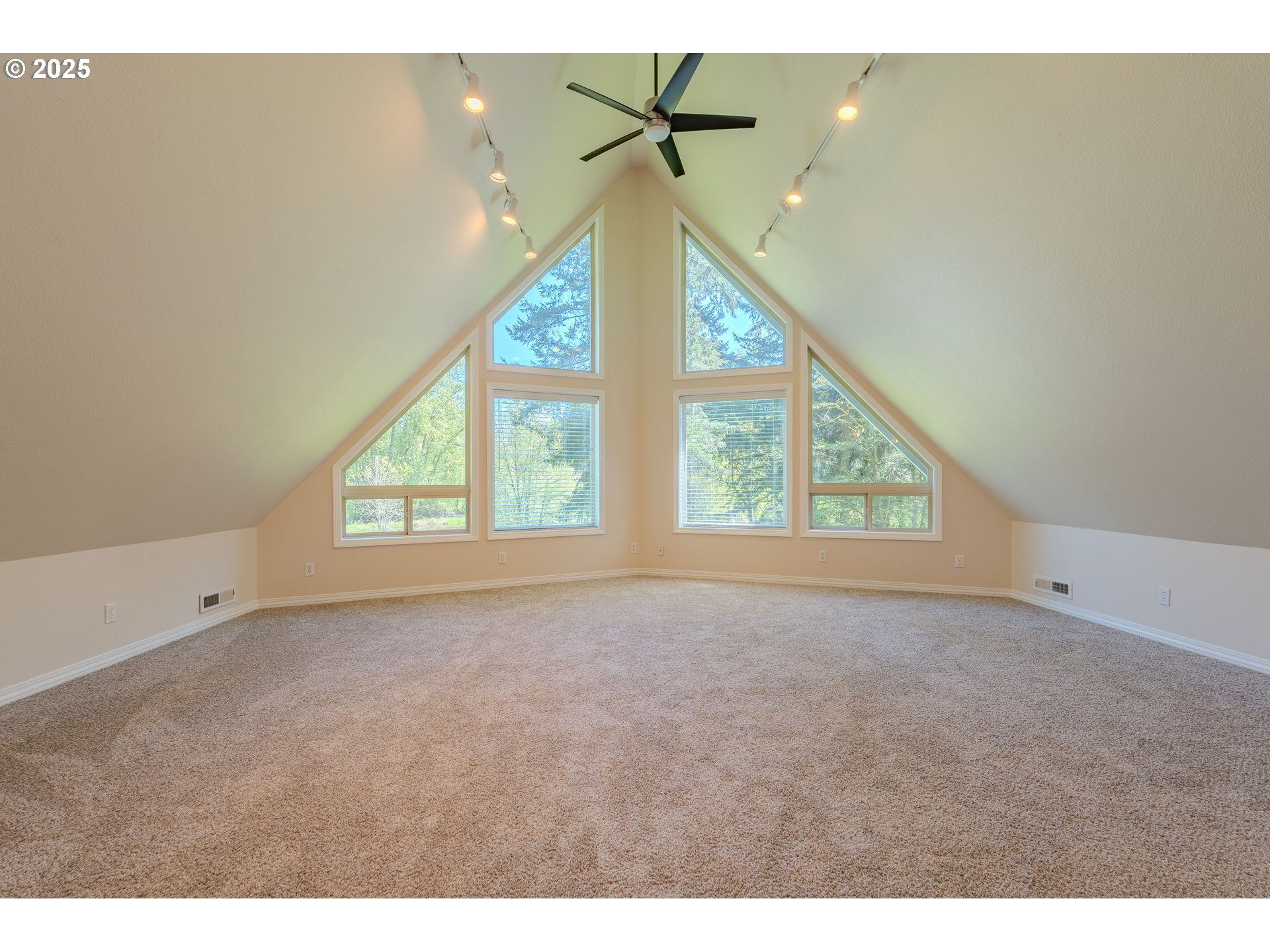 2126 Northeast 194th Street Ridgefield, WA 98642 - Photo 31 of 44 a view of an empty room with a window