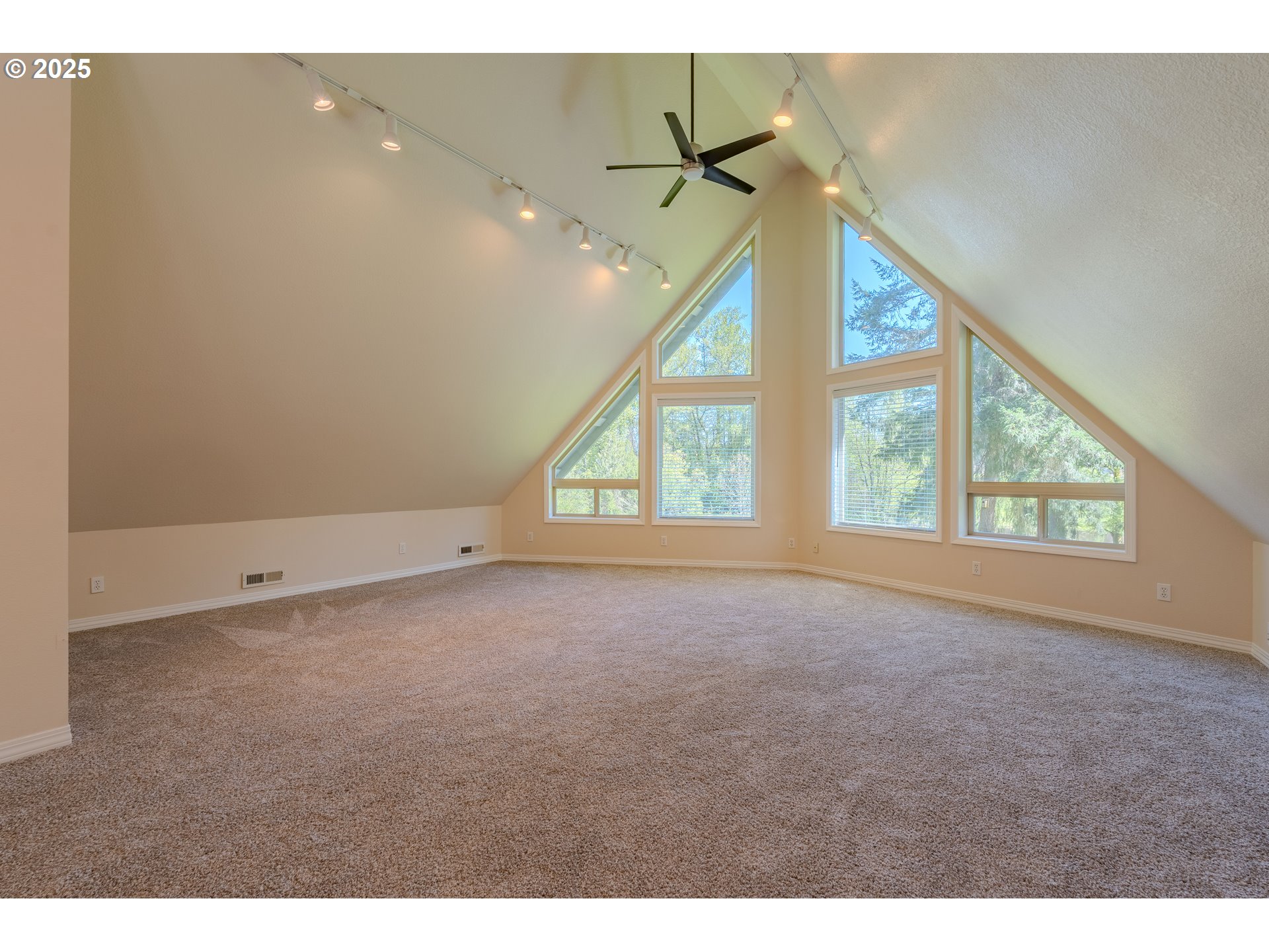 2126 Northeast 194th Street Ridgefield, WA 98642 - Photo 32 of 44 a view of an empty room with a window