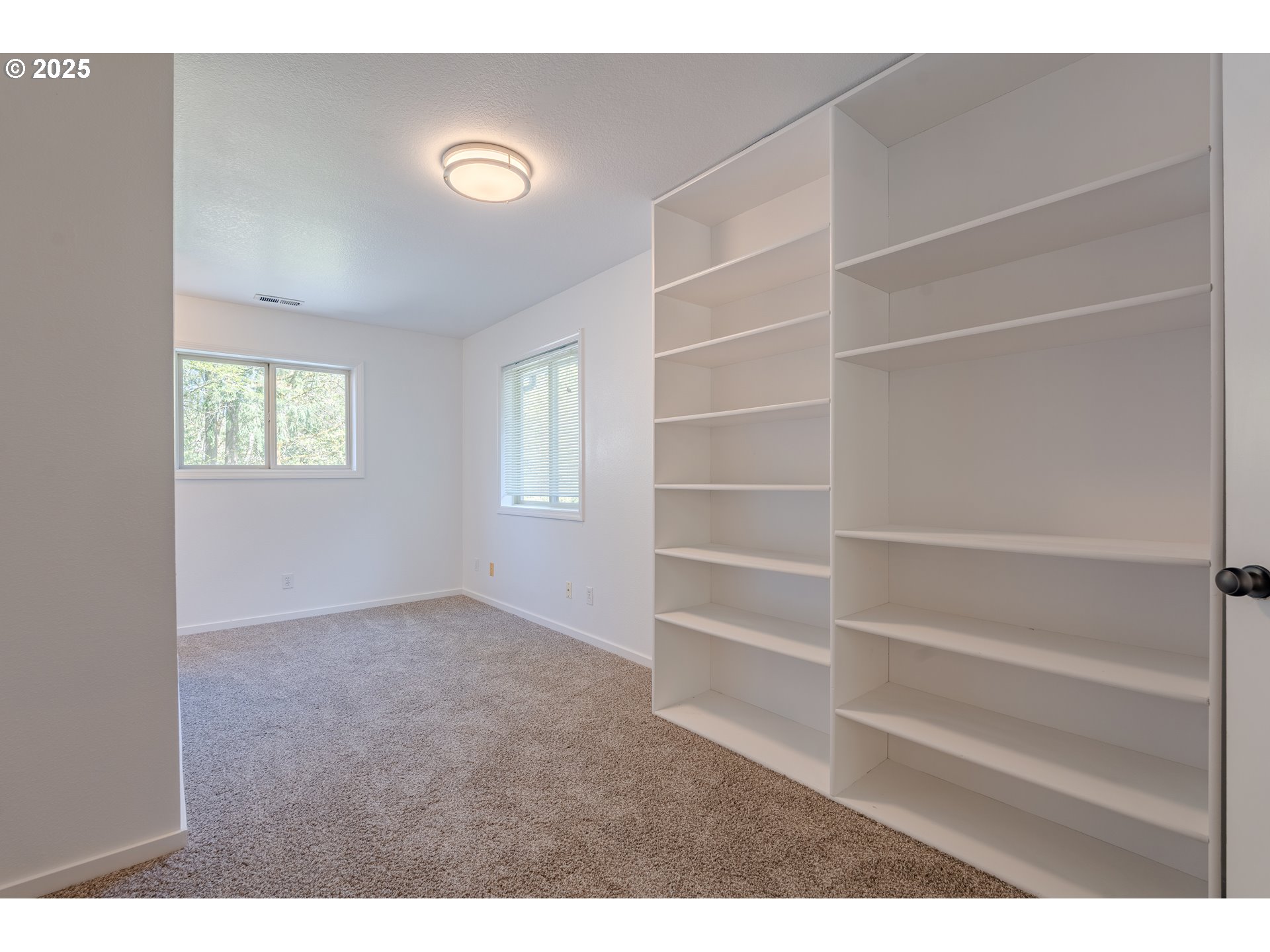 2126 Northeast 194th Street Ridgefield, WA 98642 - Photo 36 of 44 a view of an empty room with a window