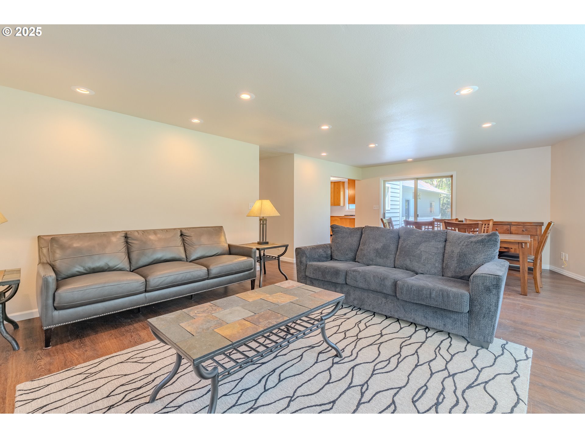 2126 Northeast 194th Street Ridgefield, WA 98642 - Photo 9 of 44 a living room with furniture and a couch