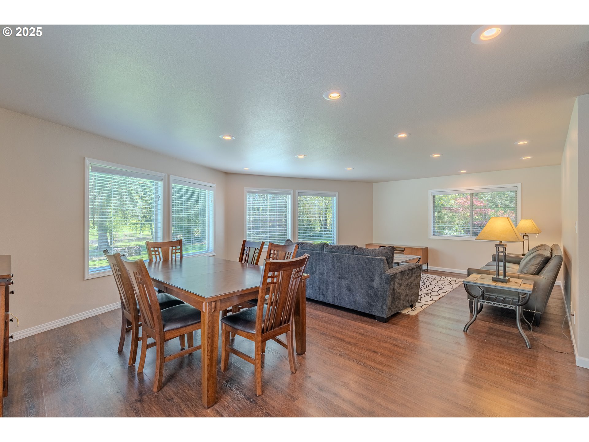 2126 Northeast 194th Street Ridgefield, WA 98642 - Photo 10 of 44 a dining room with furniture and wooden floor