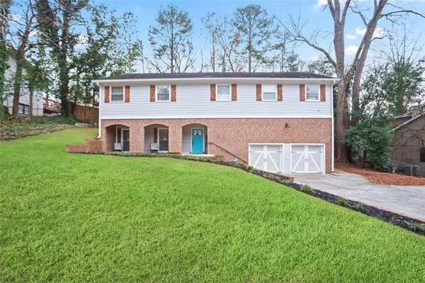 a front view of house with yard