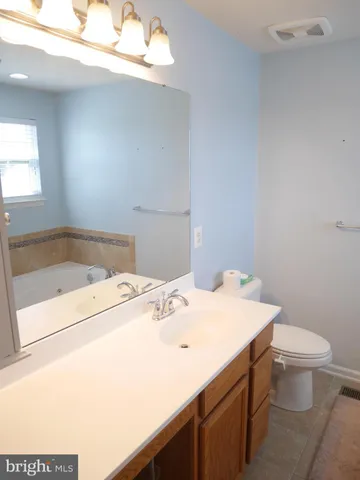 a bathroom with a sink and a toilet