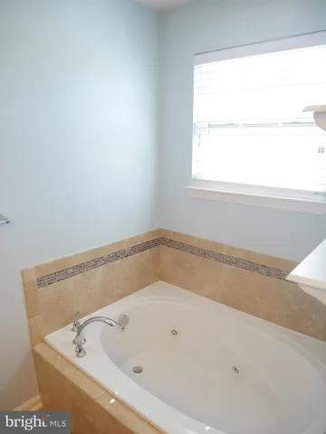 a view of a bathtub in a bathroom