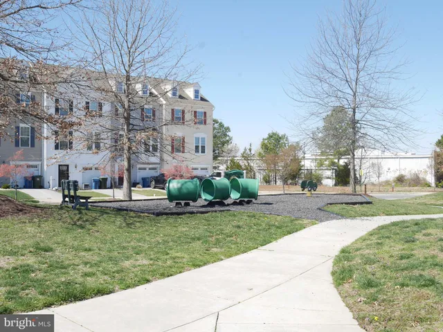 a view of a patio with a yard