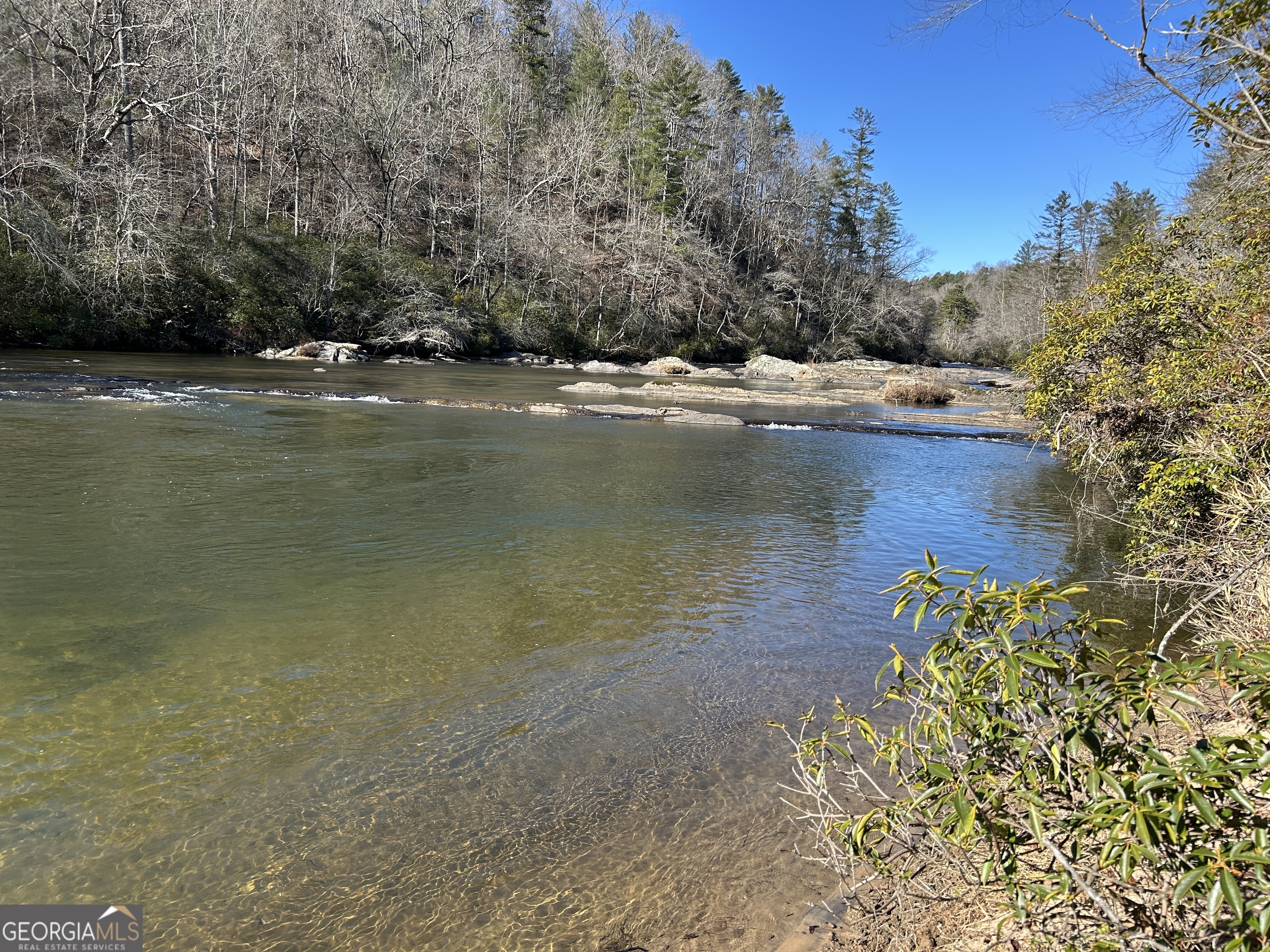 0 Twin River Orchard Road, Unit TRACT 2 Demorest, GA 30535 - Photo 14 of 24 a view of a lake with houses in the background