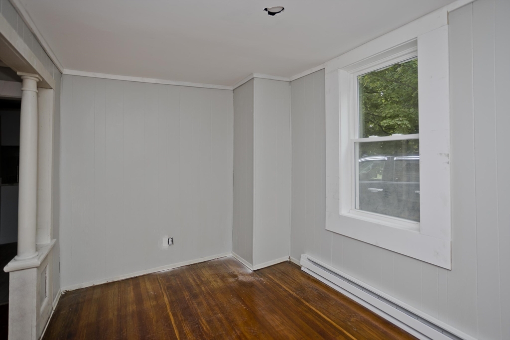 293-295 Water Street Springfield, MA 01151 - Photo 11 of 36 a view of an empty room with a window