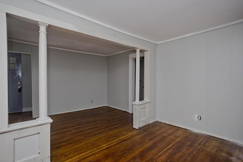 293-295 Water Street Springfield, MA 01151 - Photo 12 of 36 a view of an empty room with wooden floor and closet