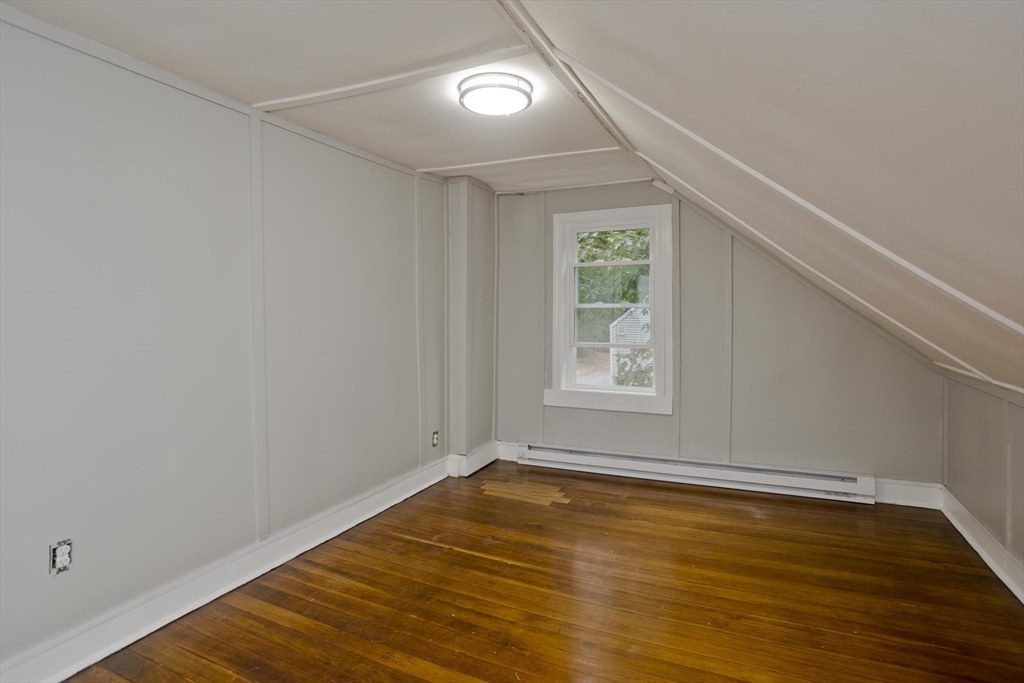 293-295 Water Street Springfield, MA 01151 - Photo 18 of 36 a view of room with window and wooden floor