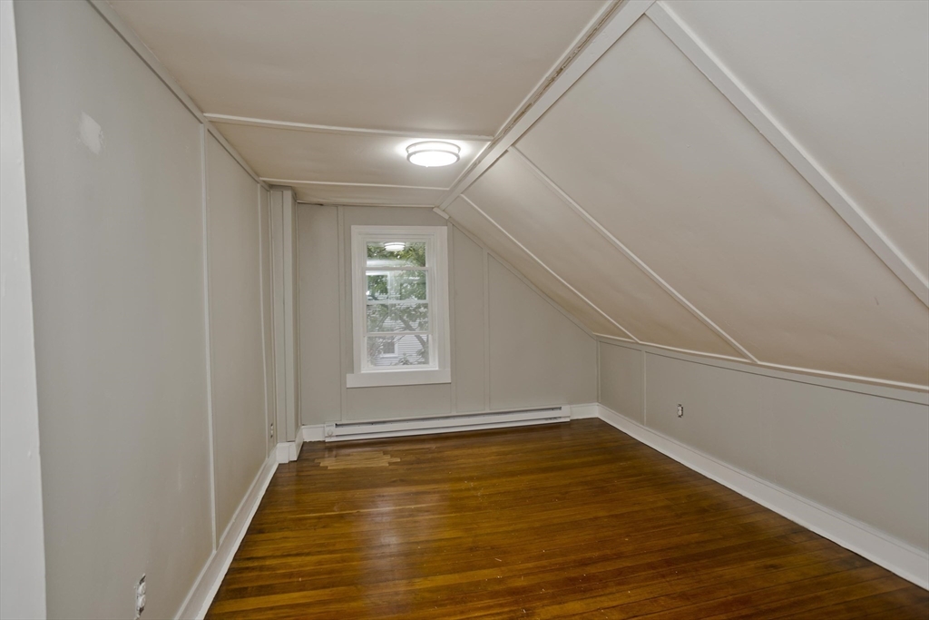 293-295 Water Street Springfield, MA 01151 - Photo 19 of 36 a view of a room with wooden floor and window