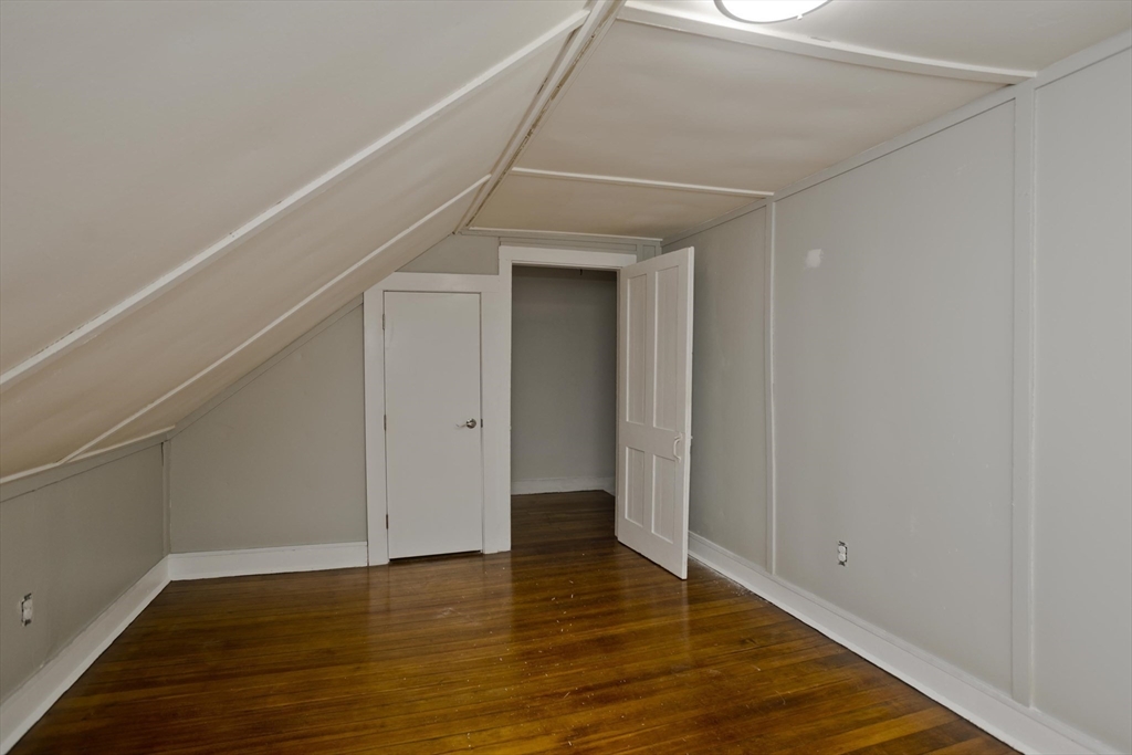 293-295 Water Street Springfield, MA 01151 - Photo 20 of 36 a view of an empty room with wooden floor