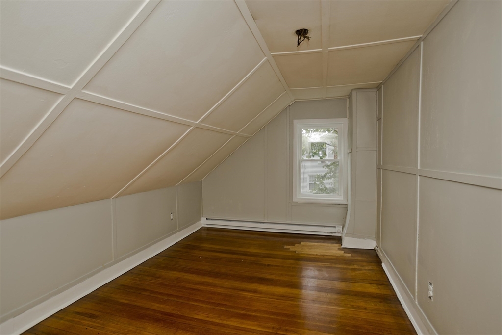 293-295 Water Street Springfield, MA 01151 - Photo 23 of 36 a view of a room with wooden floor and window