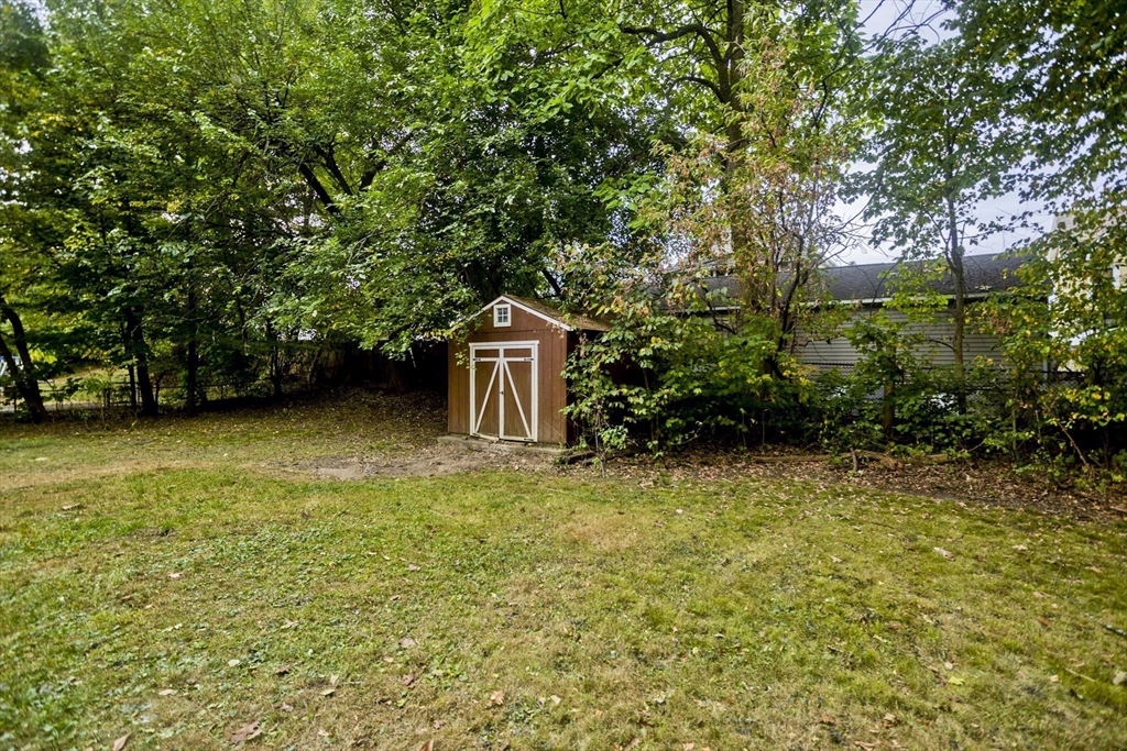 293-295 Water Street Springfield, MA 01151 - Photo 34 of 36 a view of a house with a yard