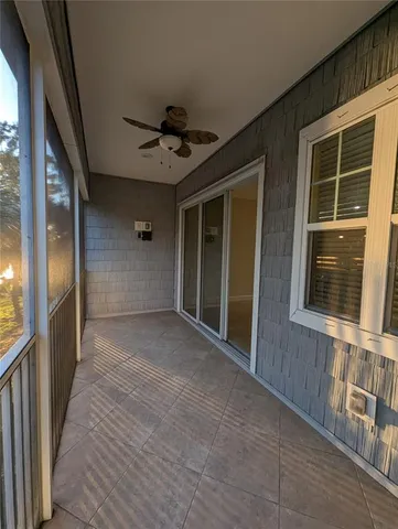 a view of a porch with wooden floor and entryway