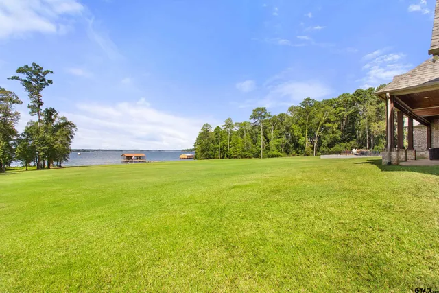 a view of a balcony with ocean view