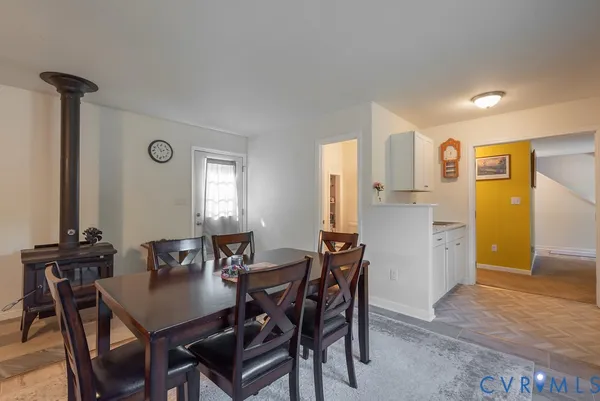 a kitchen with stainless steel appliances granite countertop a sink refrigerator and microwave