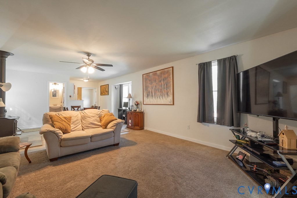 19001 Old Stage Road Dinwiddie, VA 23841 - Photo 20 of 84 a bedroom with a bed and a couch