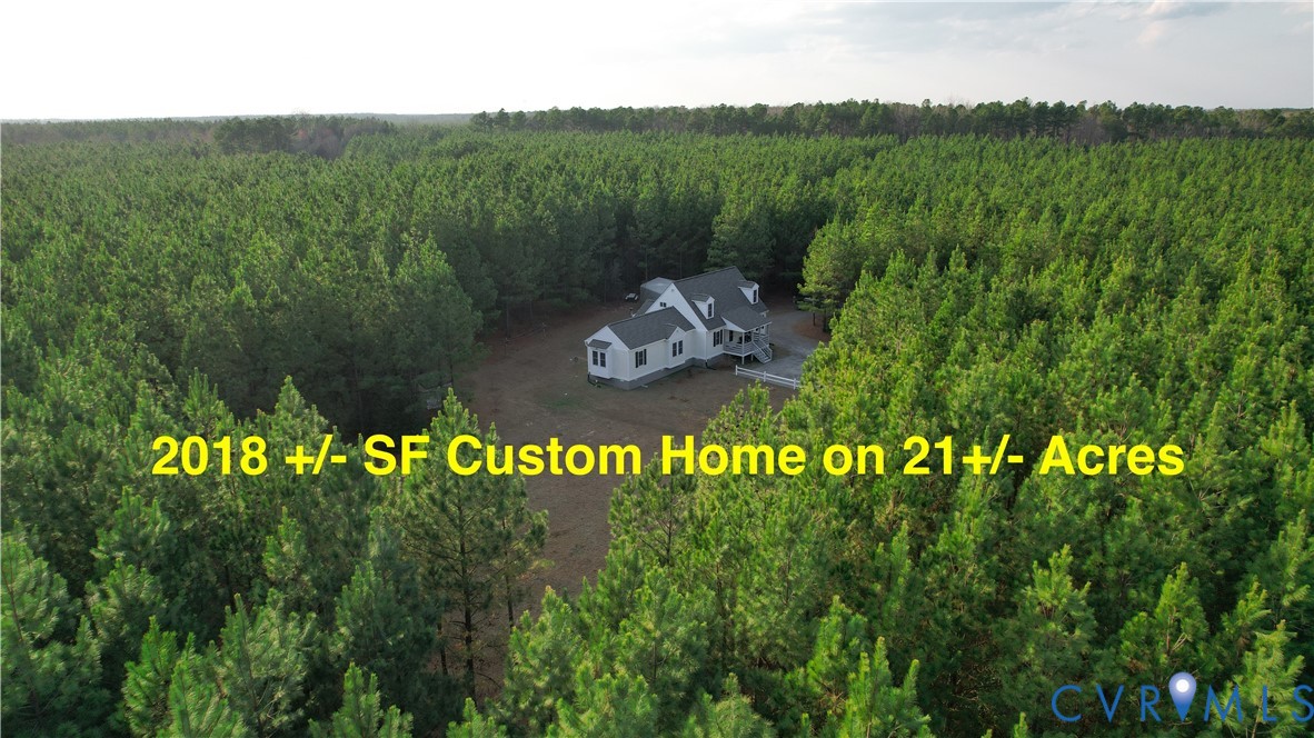 19001 Old Stage Road Dinwiddie, VA 23841 - Photo 2 of 84 a view of a house with a garden