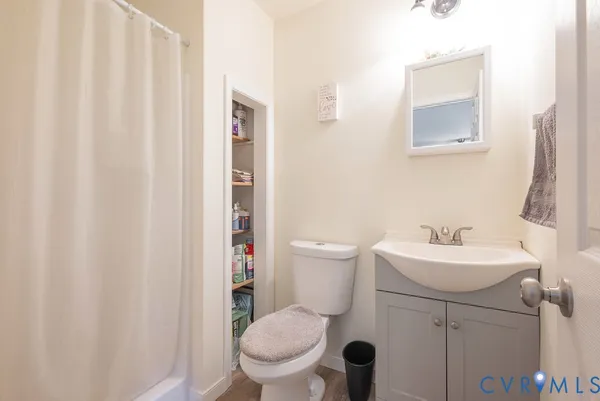 a kitchen with sink and cabinets