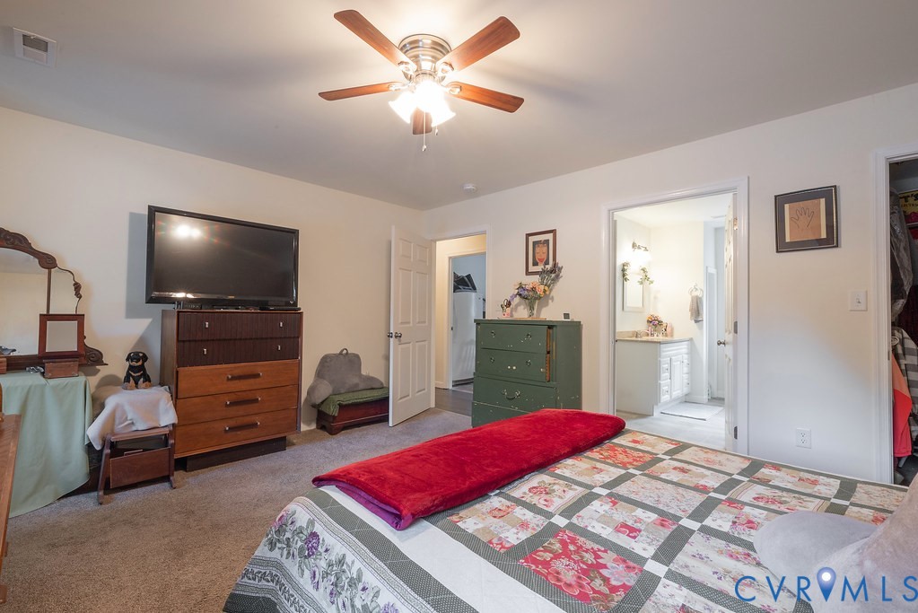 19001 Old Stage Road Dinwiddie, VA 23841 - Photo 33 of 84 a bedroom with a bed and a view of bedroom