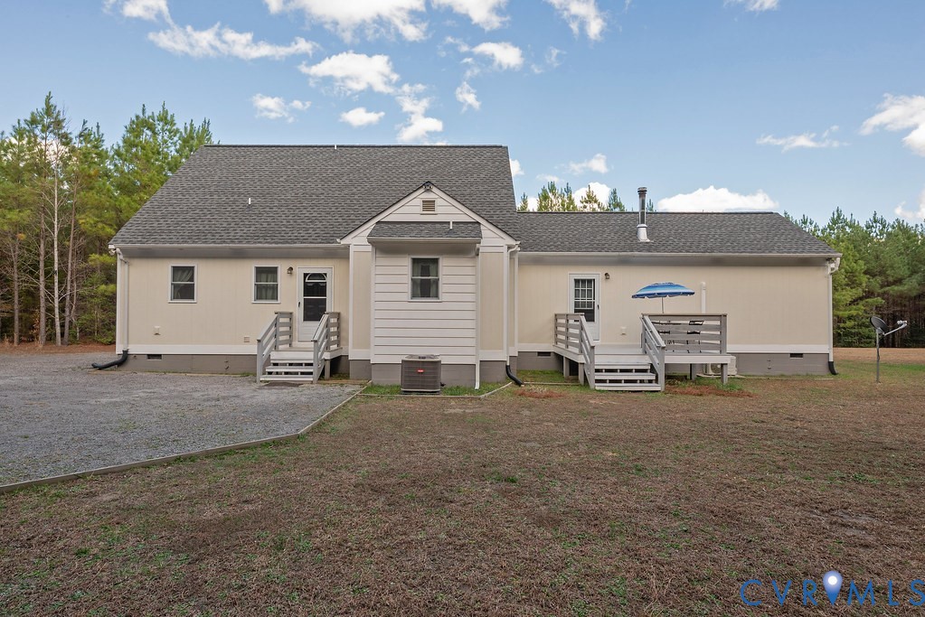 19001 Old Stage Road Dinwiddie, VA 23841 - Photo 56 of 84 a view of a house with backyard