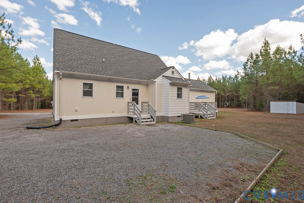 19001 Old Stage Road Dinwiddie, VA 23841 - Photo 57 of 84 a view of a house with backyard