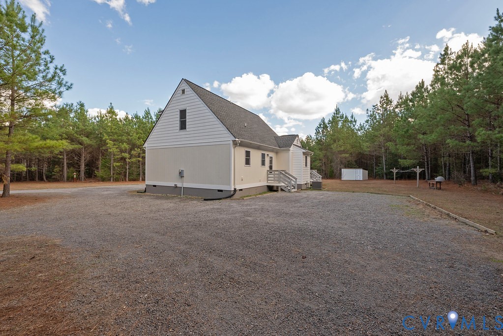 19001 Old Stage Road Dinwiddie, VA 23841 - Photo 58 of 84 a view of a house with a yard and large tree