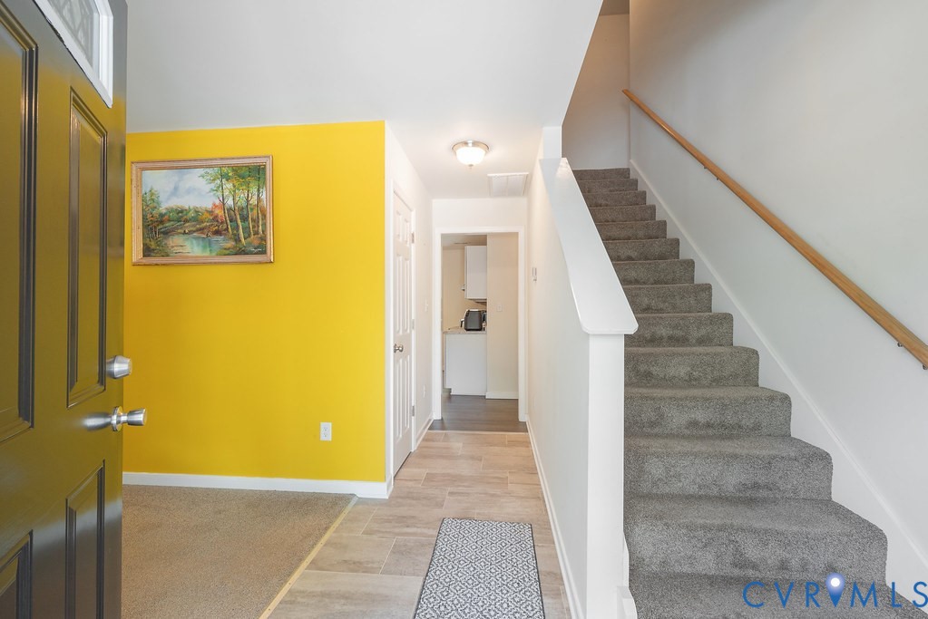 19001 Old Stage Road Dinwiddie, VA 23841 - Photo 10 of 84 a view of a hallway with wooden floor and staircase