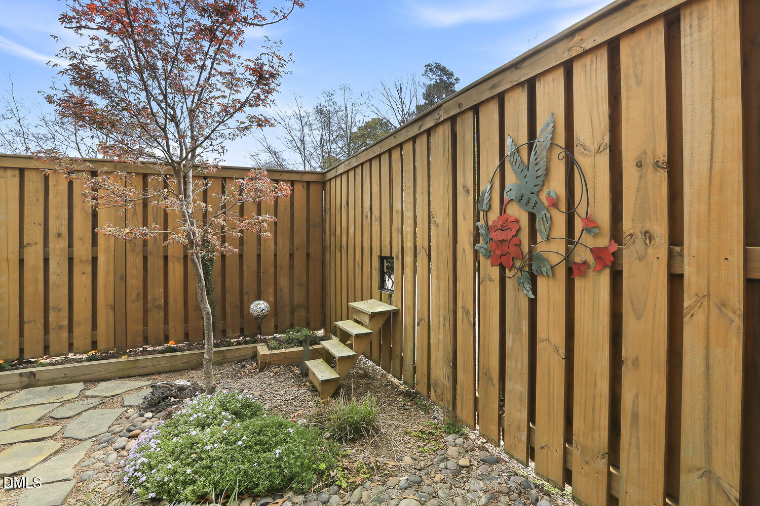 6023 Sentinel Drive Raleigh, NC 27609 - Photo 40 of 53 a view of a house with backyard and wooden fence