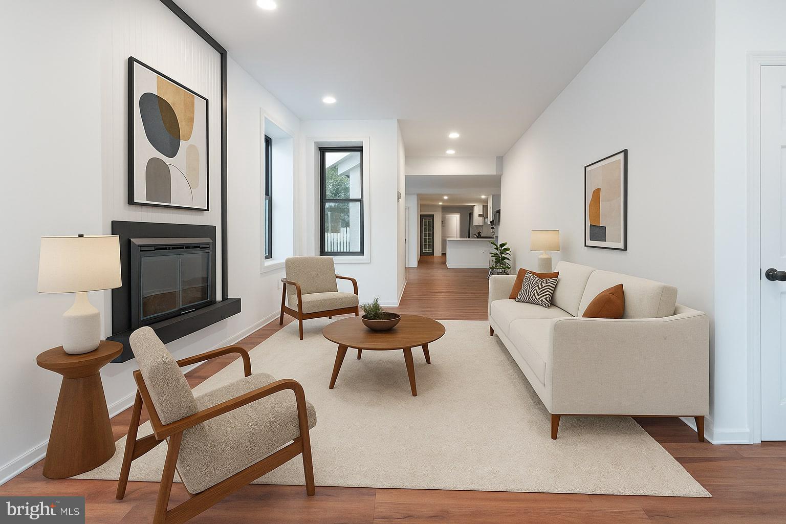 32 East Elm Street Norristown, PA 19401 - Photo 16 of 65 a living room with furniture and a fireplace