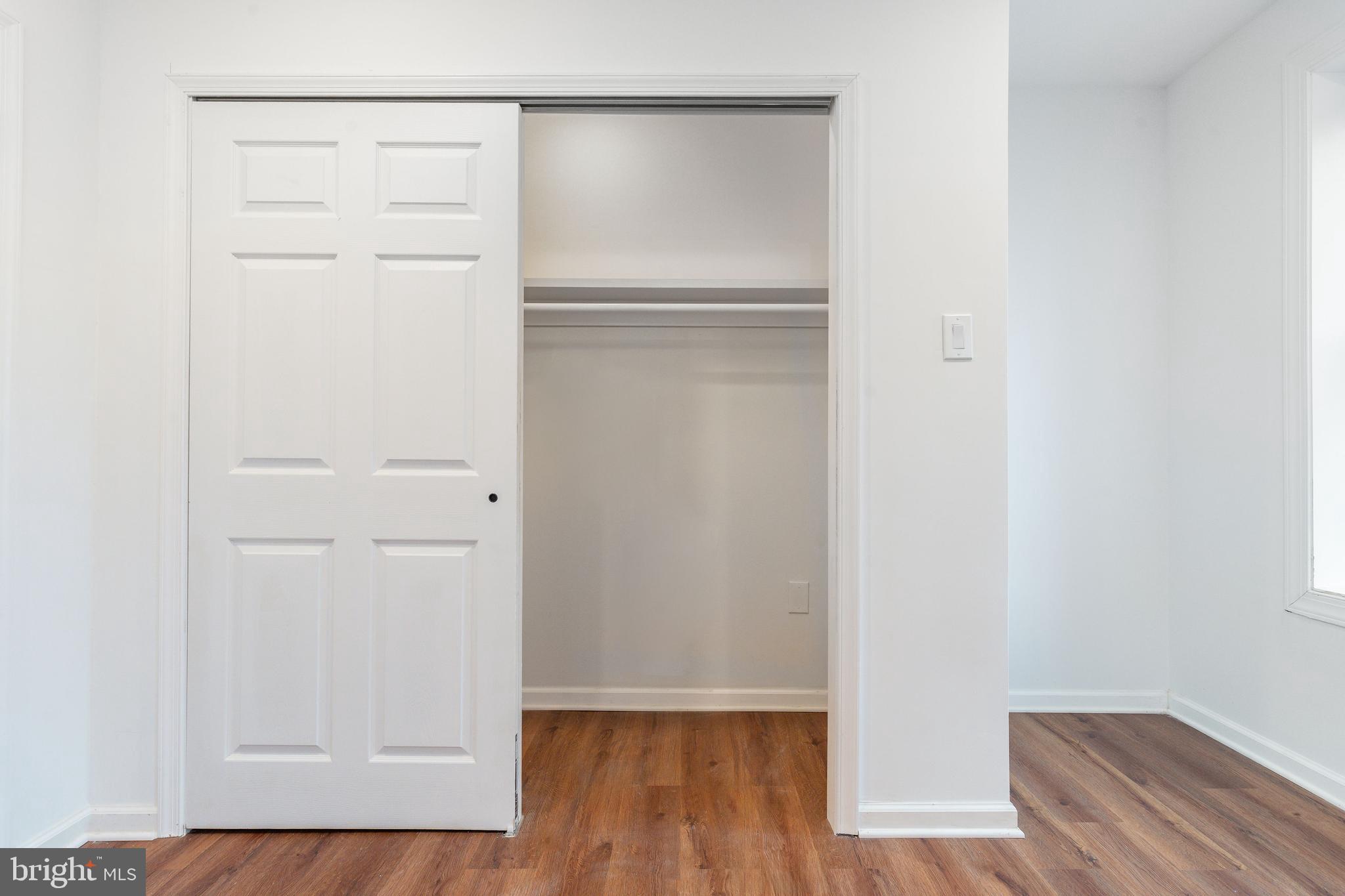 32 East Elm Street Norristown, PA 19401 - Photo 25 of 65 a view of walk in closet with wooden floor