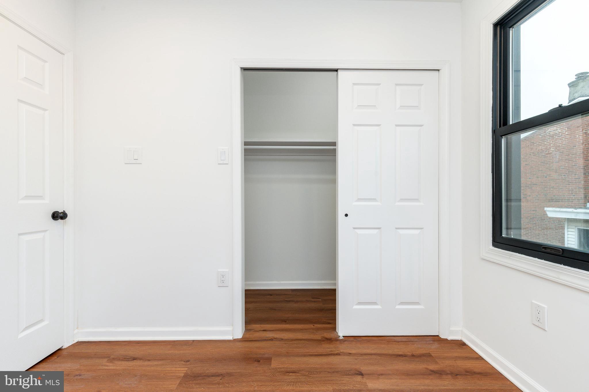 32 East Elm Street Norristown, PA 19401 - Photo 40 of 65 a view of empty room with wooden floor