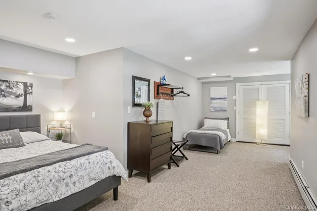 a bedroom with a bed and furniture