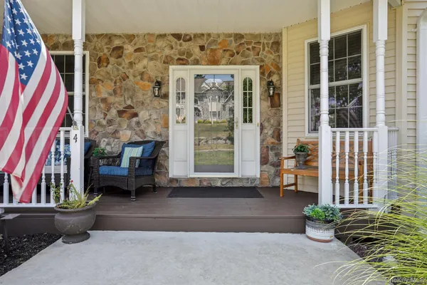 a front view of a house with outdoor space