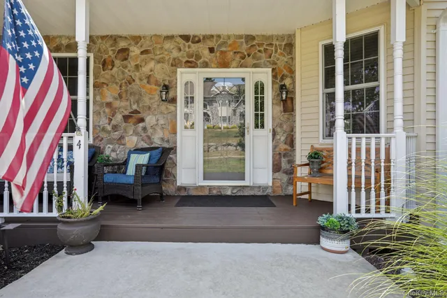 a front view of a house with outdoor space